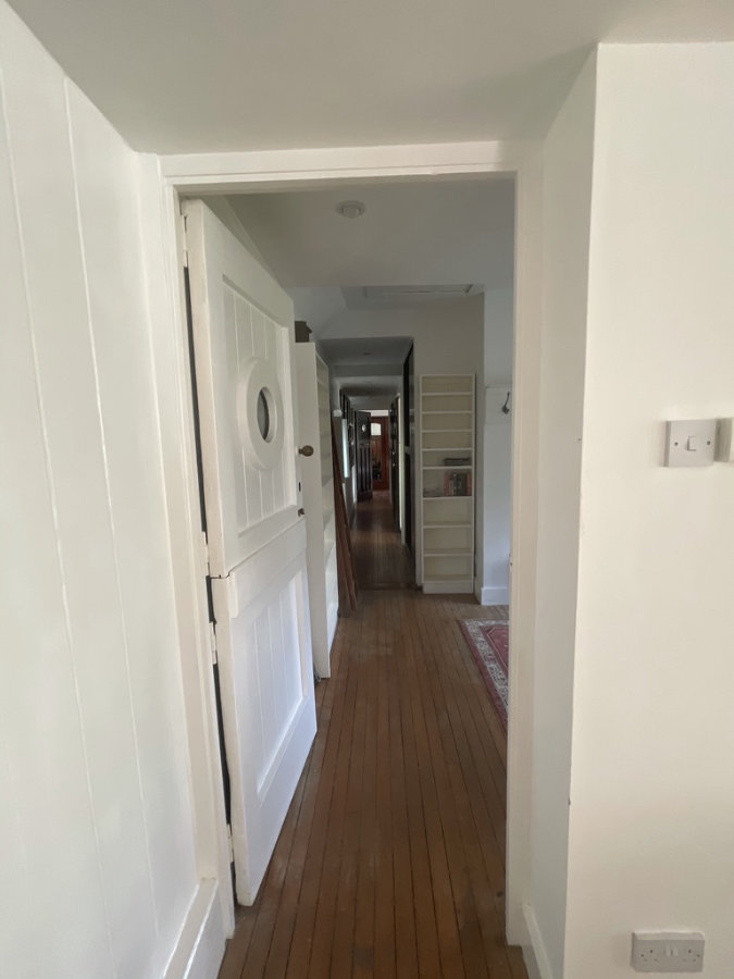 Hallway, porthole, wooden floor